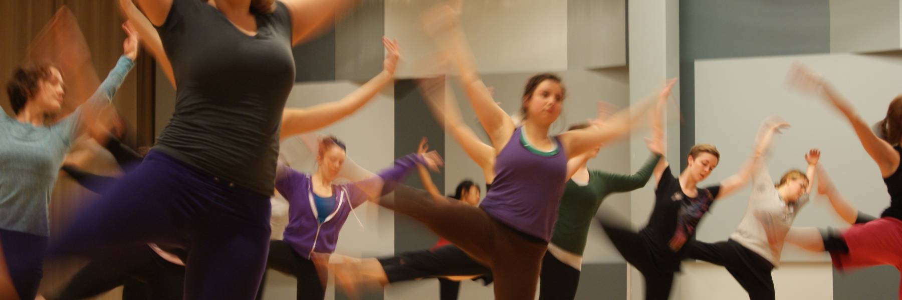 Image of dancers dancing in a dance studio