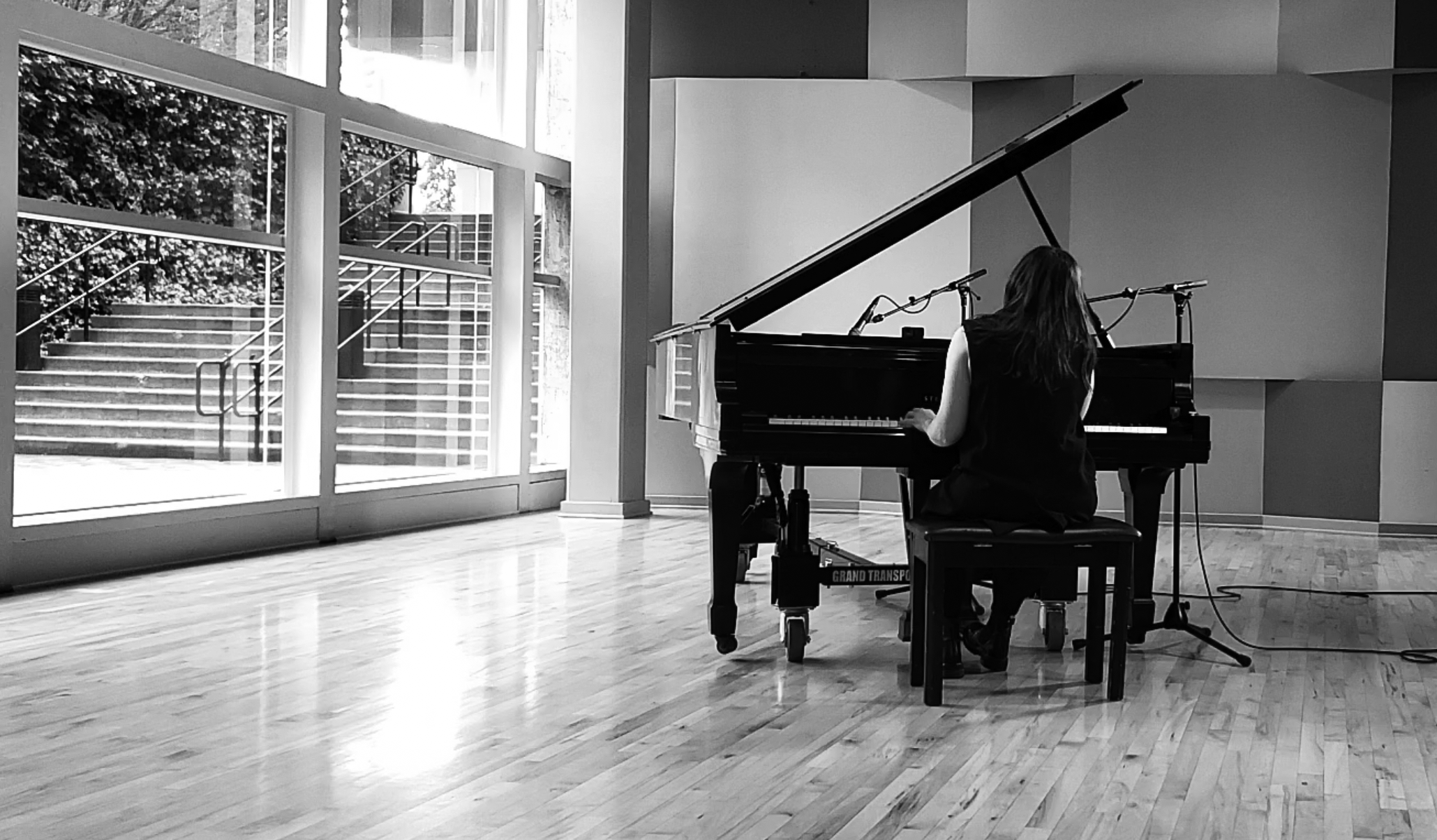 Emily Wells Piano Black and White Photo of Emily Wells playing the piano